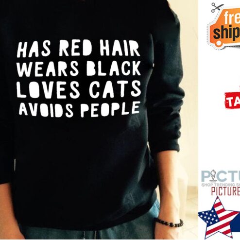 Has red hair wears black loves cats avoids people shirt