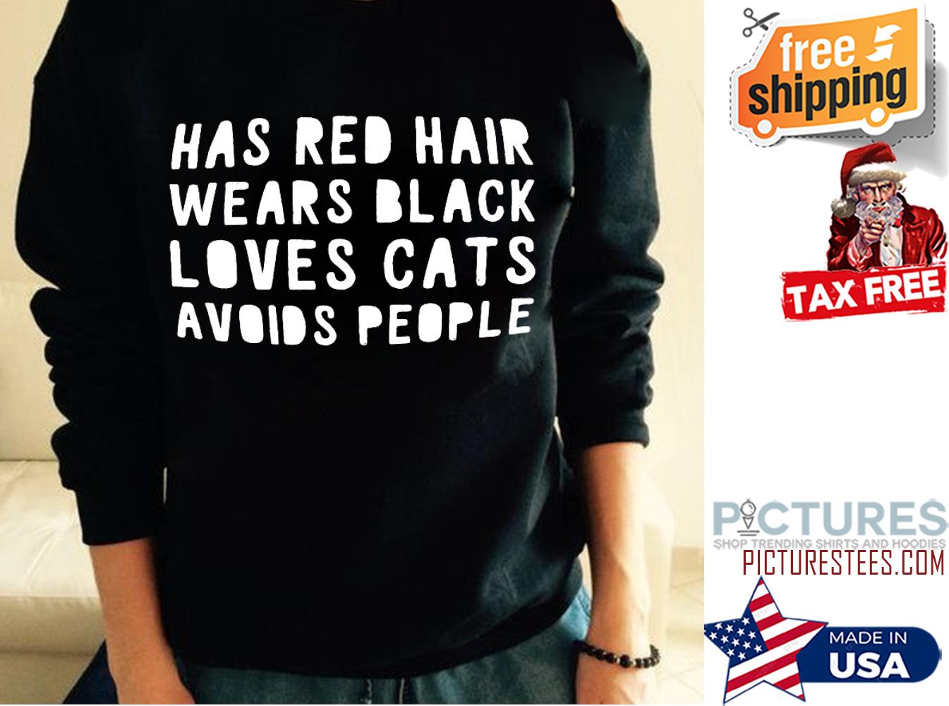 Has red hair wears black loves cats avoids people shirt