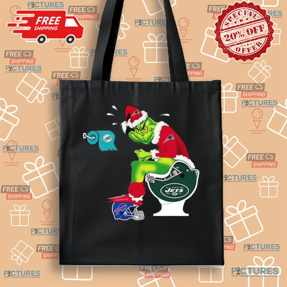 The Grinch Sitting On A Toilet Wearing A New England Patriot Toilet Miami Dolphins New York Jets Christmas Shirt