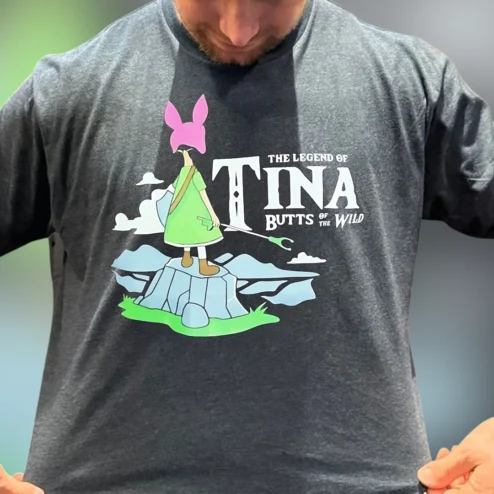 The Legend of Tina Butts of the Wild Tee Funny Tina Belcher Parody Graphic T-Shirt