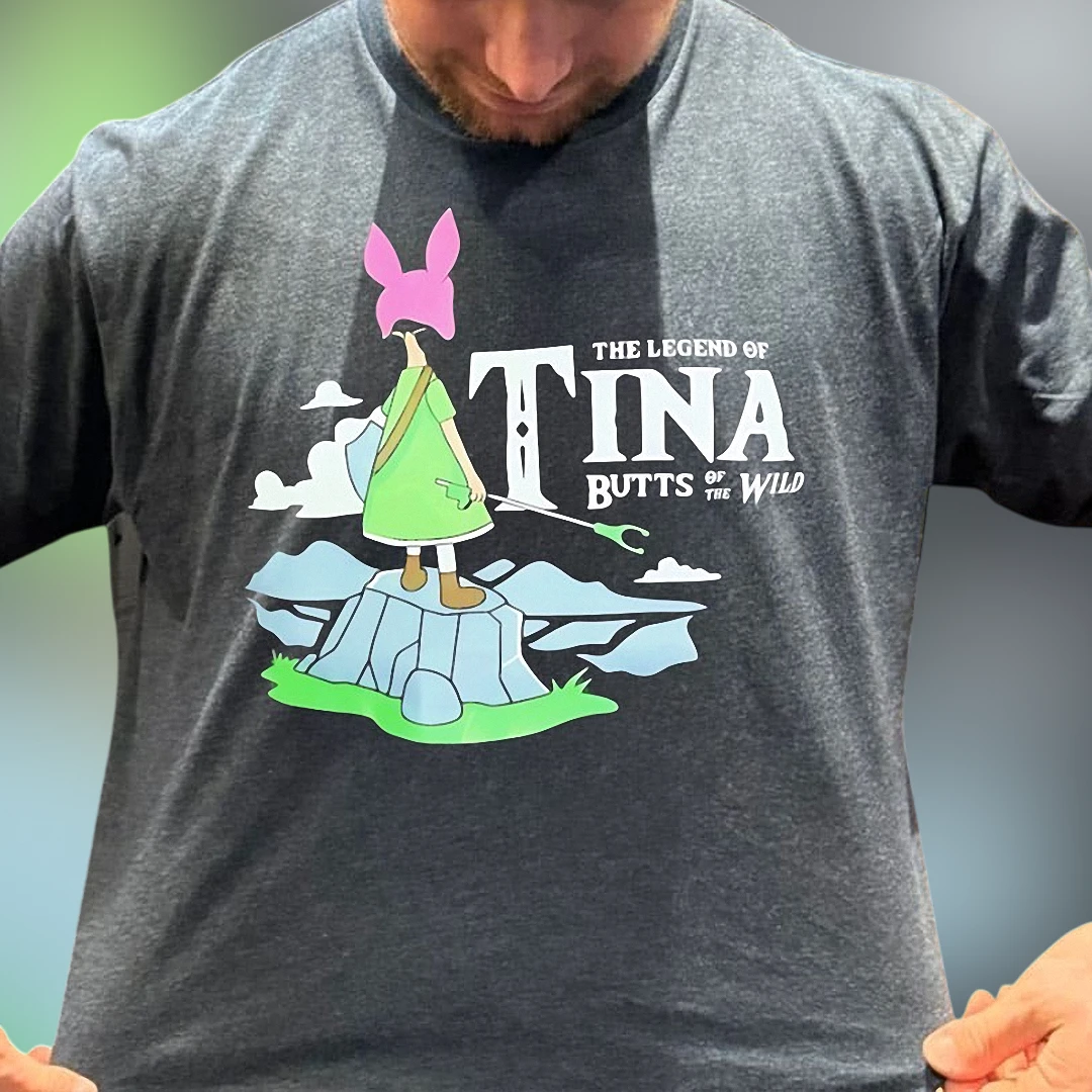 The Legend of Tina Butts of the Wild Tee Funny Tina Belcher Parody Graphic T-Shirt