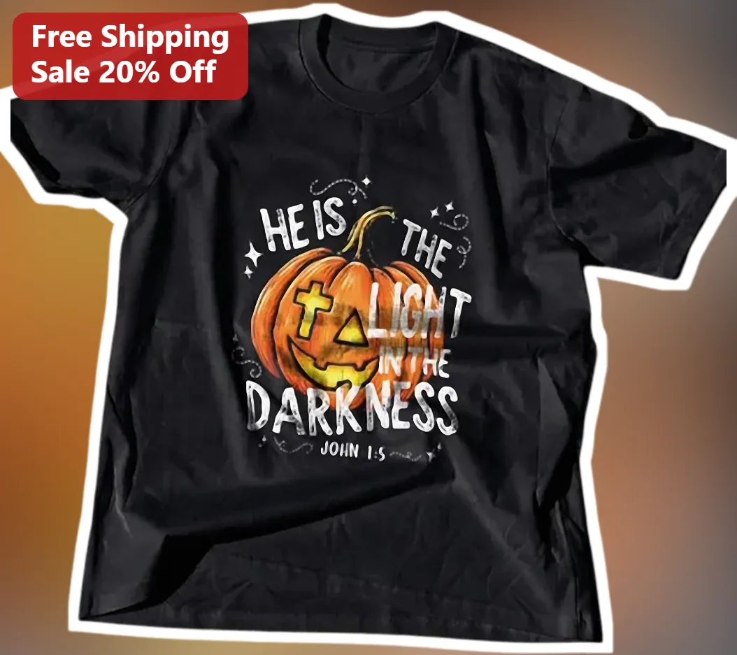 He Is The Light In The Darkness John 1:5 Christian Halloween Pumpkin Tee