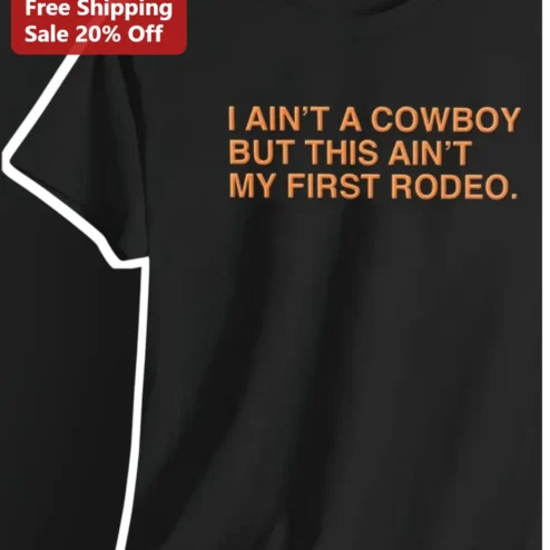 I AIN'T A COWBOY But This AIN'T My First Rodeo Graphic Tee Western Country Humor Shirt