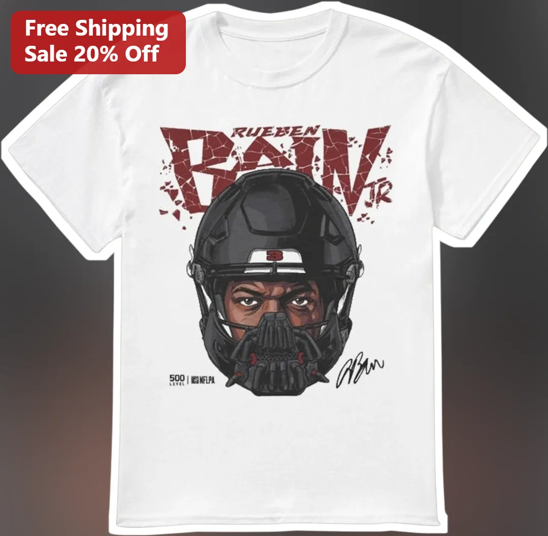 Rueben Bain Jr Game Face Villain Mask Football Tee available at our Chicago, Illinois warehouse