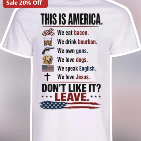 This Is America We Eat Bacon Drink Bourbon Own Guns Love Dogs Jesus Patriotic Funny Graphic Tee