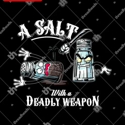 A SALT With a DEADLY WEAPON Funny Chef Pun Tee for Home Cooks and Foodies on a hanger, ready to ship from Chicago, Illinois