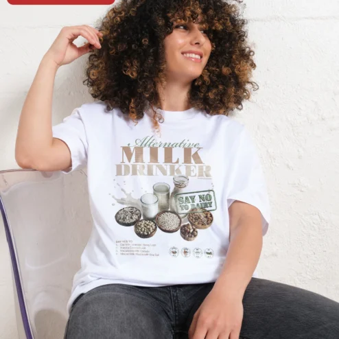 Customer in Chicago, Illinois wearing Alternative Milk Drinker Say No To Dairy Graphic Tee Plant Based Coffee Lover Gift