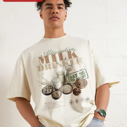 Alternative Milk Drinker Say No To Dairy Plant Based Vegan Graphic Tee on a hanger, ready to ship from Chicago, Illinois
