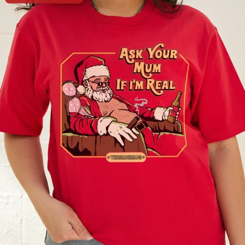 Customer in Chicago, Illinois wearing Ask Your Mum If I'm Real Tee Funny Santa Claus Graphic Shirt for Adults