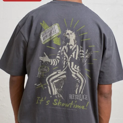 Customer in Chicago, Illinois wearing Beetlejuice Vintage Horror Graphic Tee It's Show Time Retro Gothic Streetwear Shirt