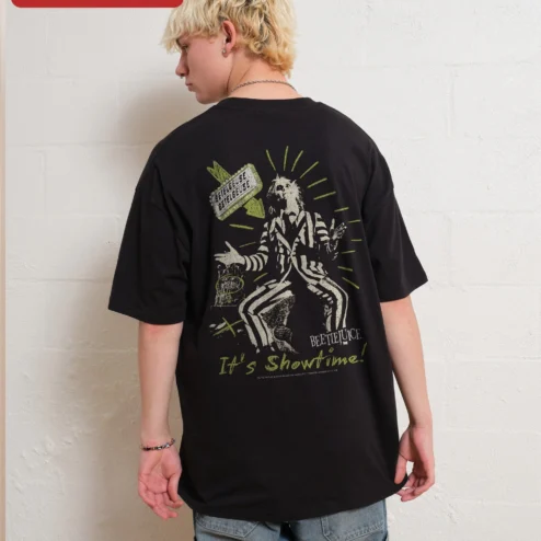 Customer in Chicago, Illinois wearing Beetlejuice Vintage Horror Graphic Tee It's Show Time Retro Gothic Streetwear Shirt