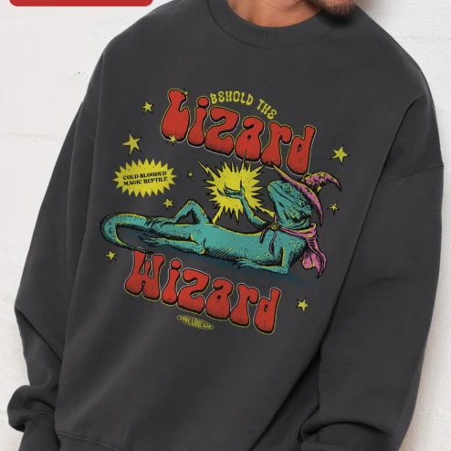 Customer in Chicago, Illinois wearing Behold The Lizard Wizard Cold-Blooded Magic Reptile Sweatshirt