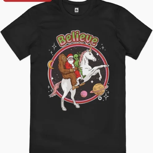 Customer in Chicago, Illinois wearing Believe Tee Funny Christmas Santa Bigfoot Alien Unicorn Graphic Shirt Holiday Gift