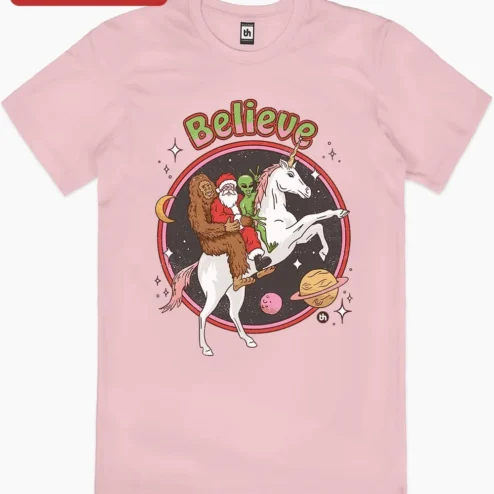 Customer in Chicago, Illinois wearing Believe Tee Funny Christmas Santa Bigfoot Alien Unicorn Graphic Shirt Holiday Gift