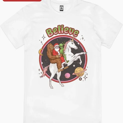 Close-up of Believe Tee Funny Christmas Santa Bigfoot Alien Unicorn Graphic Shirt Holiday Gift for streetwear fans in Chicago, Illinois