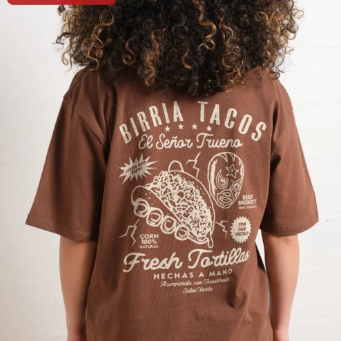 Customer in Chicago, Illinois wearing Birria Tacos El Señor Trueno Graphic Tee for Men Women Mexican Food Lovers