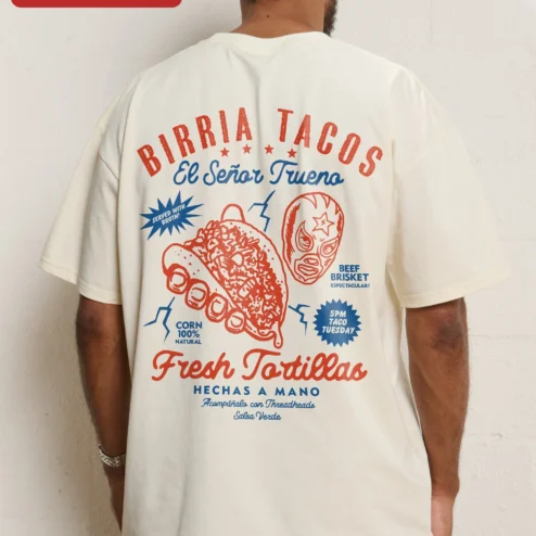 Customer in Chicago, Illinois wearing Birria Tacos El Señor Trueno Graphic Tee for Men Women Mexican Food Lovers