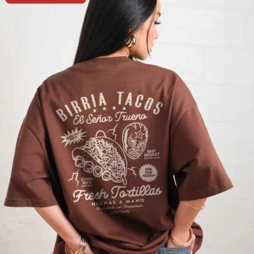 Close-up of Birria Tacos El Senor Trueno Graphic Tee Mexican Foodie Gift Lucha Libre Shirt for streetwear fans in Chicago, Illinois