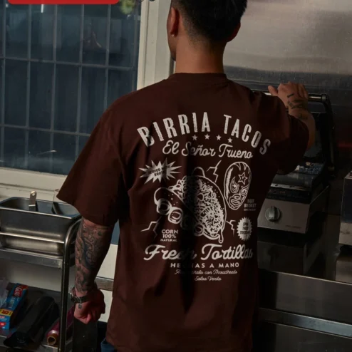Close-up of Birria Tacos El Senor Trueno Graphic Tee Mexican Foodie Gift Lucha Libre Shirt for streetwear fans in Chicago, Illinois