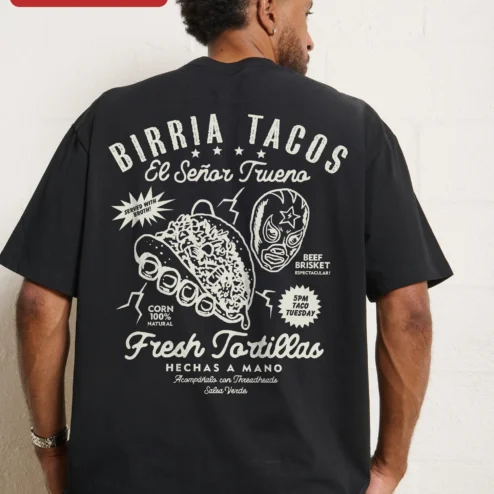 Customer in Chicago, Illinois wearing Birria Tacos El Senor Trueno Graphic Tee Mexican Foodie Gift Lucha Libre Shirt