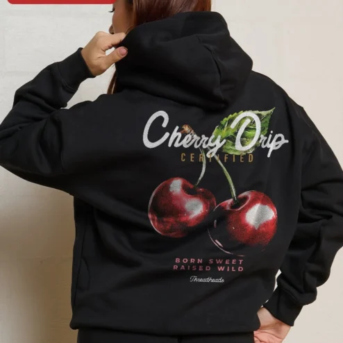 Black Cherry Graphic Pullover Hoodie Minimalist Red Cherries Chest Print Streetwear Apparel on a hanger, ready to ship from Chicago, Illinois