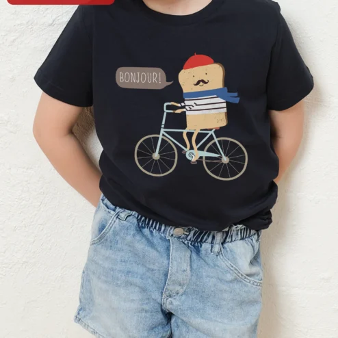 BONJOUR! French Toast Baguette Rider Graphic Tee for Kids and Foodies on a hanger, ready to ship from Chicago, Illinois