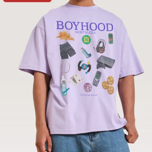 Boyhood Nostalgia Tee 90s 2000s Retro Gaming Collage Oversized Graphic Shirt for Men Women on a hanger, ready to ship from Chicago, Illinois