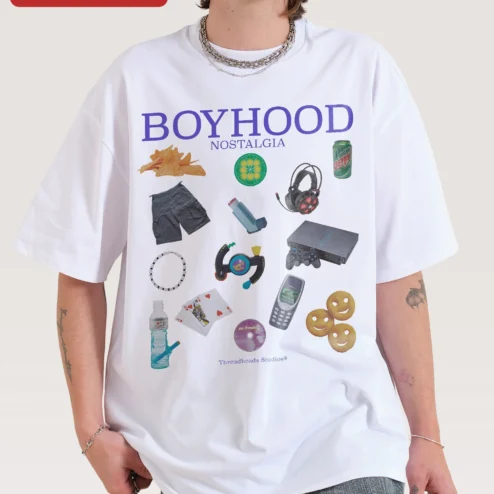 Close-up of Boyhood Nostalgia Tee 90s 2000s Retro Gaming Collage Oversized Graphic Shirt for Men Women for streetwear fans in Chicago, Illinois
