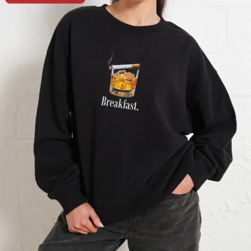 Customer in Chicago, Illinois wearing Breakfast Funny Whiskey Drink Crewneck Sweatshirt for Adults