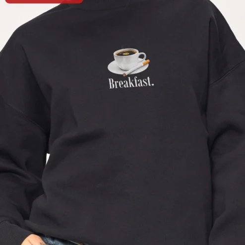 Customer in Chicago, Illinois wearing Breakfast Sweatshirt Coffee and Cigarettes Minimalist Black Crewneck Gift for Women