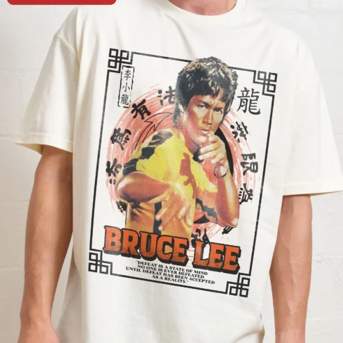 Bruce Lee Defeat Is A State Of Mind Tee Vintage Martial Arts Quote Shirt on a hanger, ready to ship from Chicago, Illinois