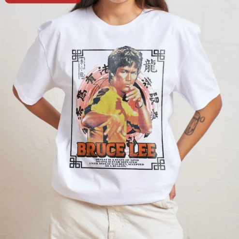 Customer in Chicago, Illinois wearing Bruce Lee Defeat Is A State Of Mind Tee Vintage Martial Arts Quote Shirt