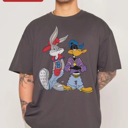 Bugs Bunny Tee Looney Tunes Daffy Duck 90s Hip Hop Streetwear Graphic Shirt on a hanger, ready to ship from Chicago, Illinois