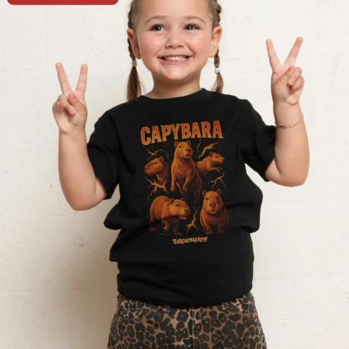 Capybara Graphic Tee Retro Rock Poster Style Kids Animal Lover Shirt on a hanger, ready to ship from Chicago, Illinois