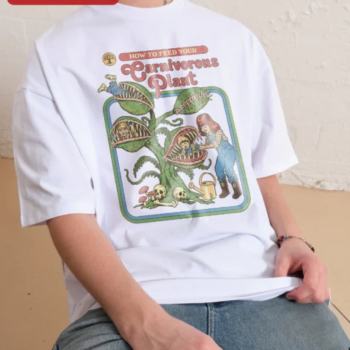 Carnivorous Plant Tee How To Feed Your Venus Flytrap Vintage Horror Graphic Shirt Gift for Gardeners on a hanger, ready to ship from Chicago, Illinois