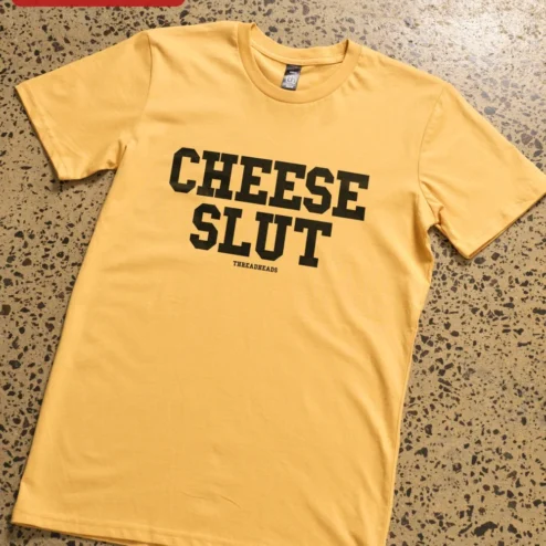 Close-up of Cheese Slut Funny Cheese Lover Tee Vintage Collegiate Graphic T-Shirt for Foodies for streetwear fans in Chicago, Illinois
