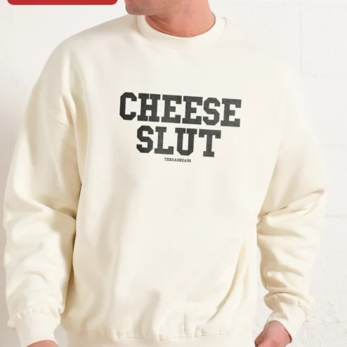Cheese Slut Sweatshirt Funny Cheese Lover Gift Novelty Pun Crewneck Apparel on a hanger, ready to ship from Chicago, Illinois