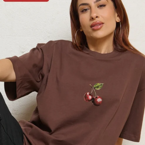 Close-up of Cherry Graphic Tee Oversized Black Cotton Shirt Minimalist Red Cherry Print Streetwear Apparel for W for streetwear fans in Chicago, Illinois