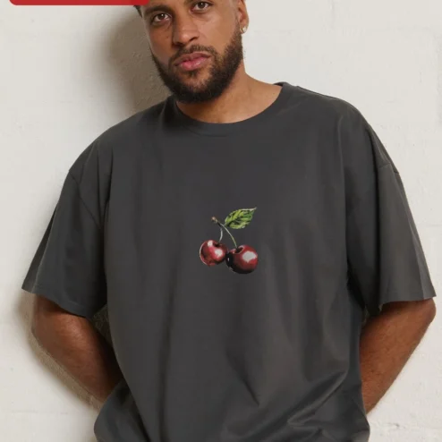 Customer in Chicago, Illinois wearing Cherry Graphic Tee Oversized Black Cotton Shirt Minimalist Red Cherry Print Streetwear Apparel for W