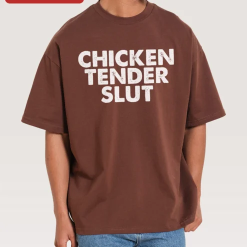 Chicken Tender Slut Tee Funny Foodie Graphic Shirt Oversized Streetwear Cotton Top on a hanger, ready to ship from Chicago, Illinois
