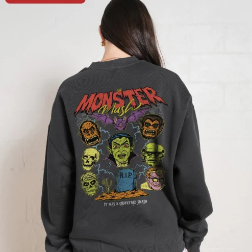 Close-up of Classic Monsters Halloween Sweatshirt Vintage Vampire Werewolf Skull Crewneck Spooky Horror Gift for streetwear fans in Chicago, Illinois