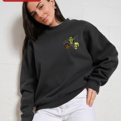 Customer in Chicago, Illinois wearing Classic Monsters Halloween Sweatshirt Vintage Vampire Werewolf Skull Crewneck Spooky Horror Gift