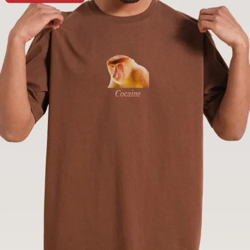 Cocaine Tee Surreal Proboscis Monkey Graphic T-Shirt for Men on a hanger, ready to ship from Chicago, Illinois