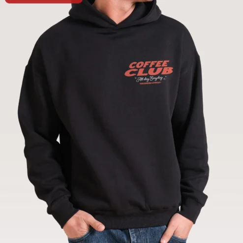 COFFEE CLUB All Day Erryday Hoodie Retro Typography Graphic Sweatshirt for Coffee Lovers on a hanger, ready to ship from Chicago, Illinois