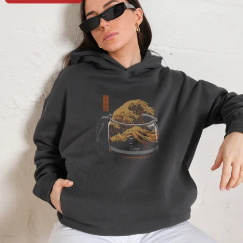 Close-up of COFFEE WAVE Hoodie Great Wave Off Kanagawa Coffee Lover Gift Unisex Pullover for streetwear fans in Chicago, Illinois