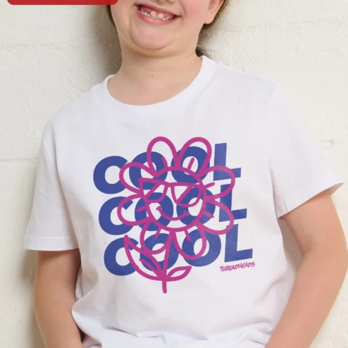 Close-up of COOL Tee Kids Retro Flower Sunglasses Graphic Shirt Boys Cool Flower T-Shirt for streetwear fans in Chicago, Illinois