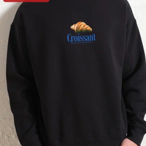 Customer in Chicago, Illinois wearing Croissant The Buttery Twist Your Diet Didn't See Coming Funny Foodie Sweatshirt