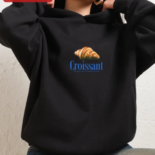 Croissant The Buttery Twist Your Diet Didn't See Coming Funny Hoodie for Foodies on a hanger, ready to ship from Chicago, Illinois