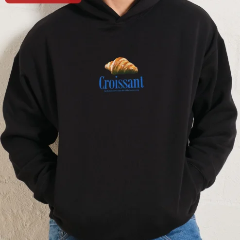 Customer in Chicago, Illinois wearing Croissant The Buttery Twist Your Diet Didn't See Coming Funny Hoodie for Foodies