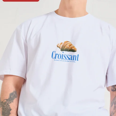 Close-up of Croissant The Buttery Twist Your Diet Didn't See Coming Graphic Tee Funny Foodie Bakery Lover Gift S for streetwear fans in Chicago, Illinois